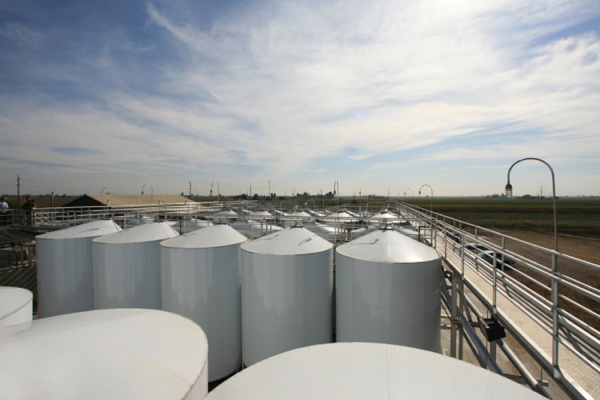 A view of many large wine tanks in use at a winery in Northern California. 